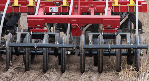 Packing force of 150 to 200 lb (70 to 90 kg) per wheel ensures that the furrow is well sealed