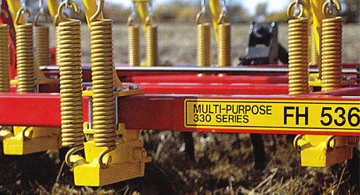 All 330 series cultivators used a 330 lb. initial tension spring cushion shank assembly.